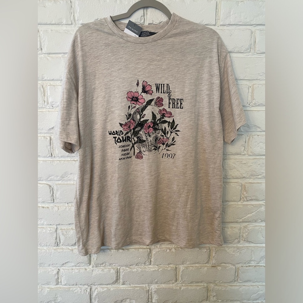 NWT oversized tee runs VERY BIG comfy 
Oatmeal color wild and free flower shirt